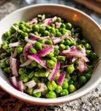 pea salad with red onions and cheese is delicious