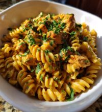 twisted pasta with honey garlic chicken and parmesan cream